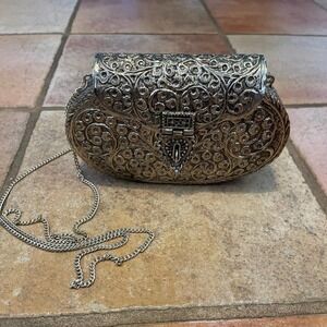 A Nepalese Silvered Metal Bag Patterned With Embossed Leaves...